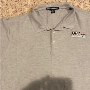 Up for sale is a Devon and Jones polo in men’s LG